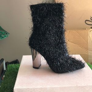 Fuzzy black boots. Smaller size